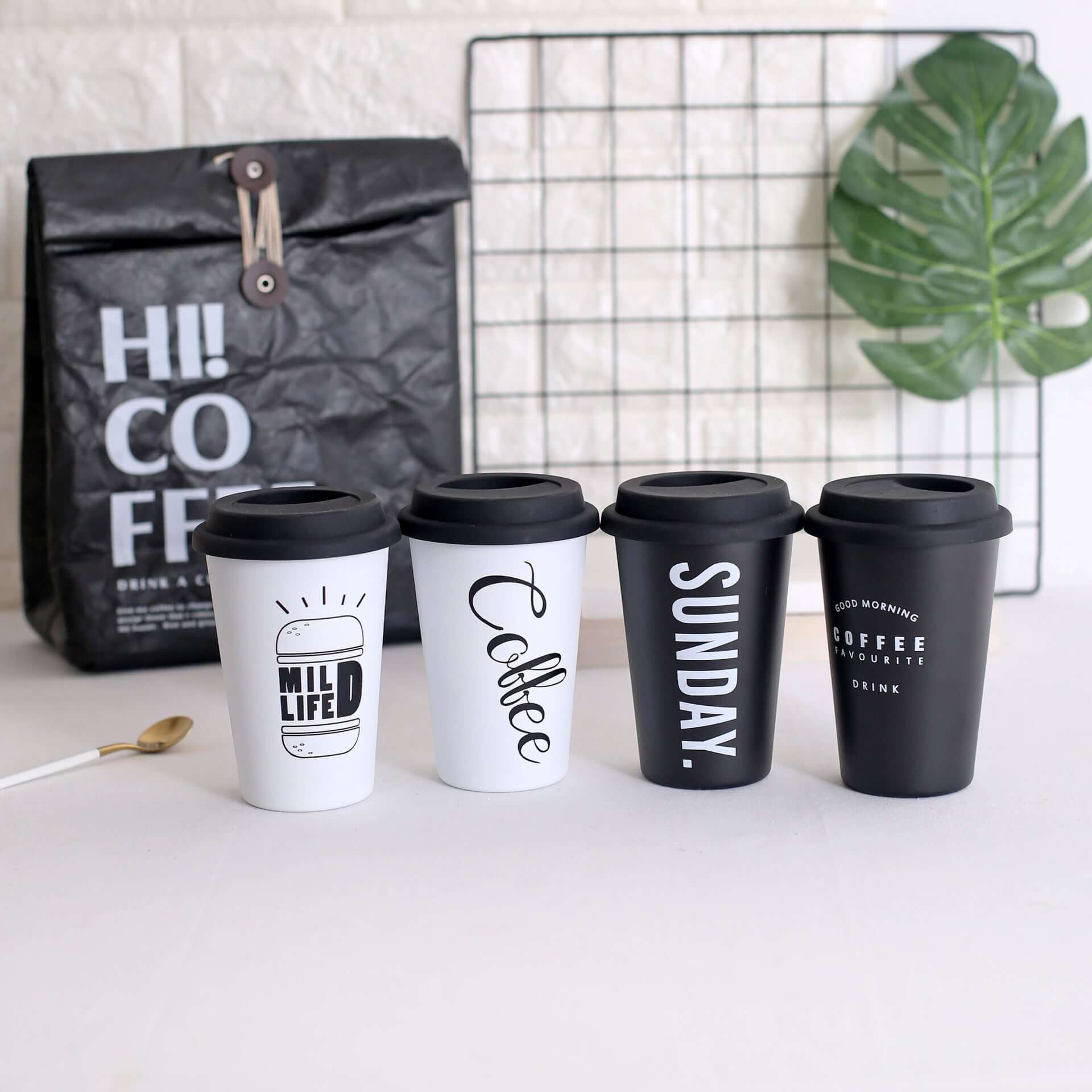 Stainless Steel Coffee Cup with Lid Izzy Coffee product packaging with clear label for online shopping